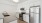 a kitchen with white cabinets