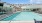 a swimming pool outside of a building