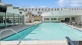 a swimming pool outside of a building