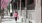 a person walking on a sidewalk