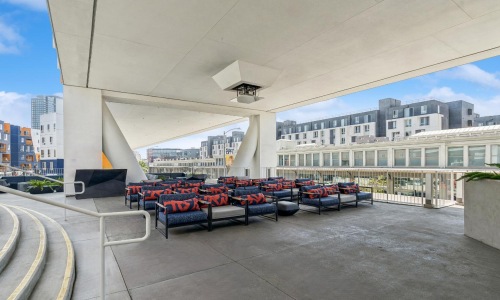 an outdoor patio with seating