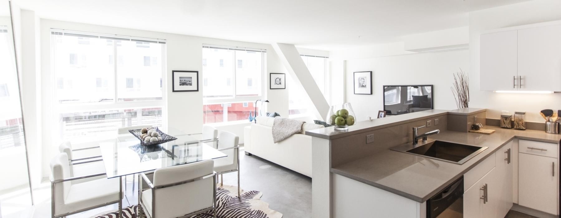 a kitchen with a table and chairs