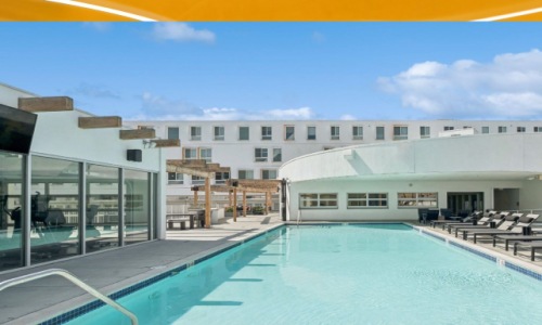 a swimming pool outside of a building